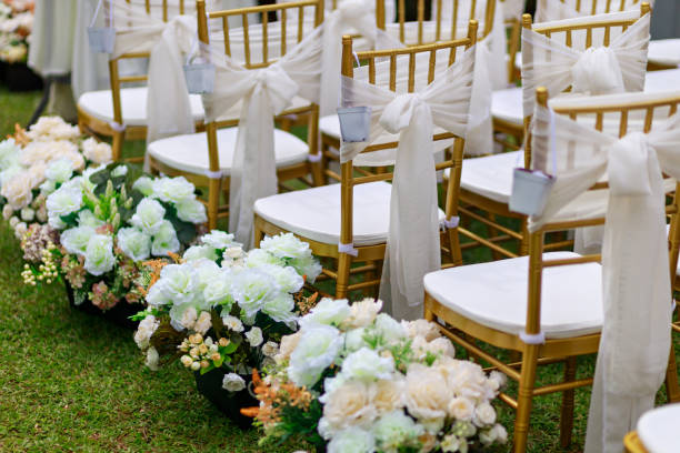 Elegant wedding ceremony with floral arch and romantic setting